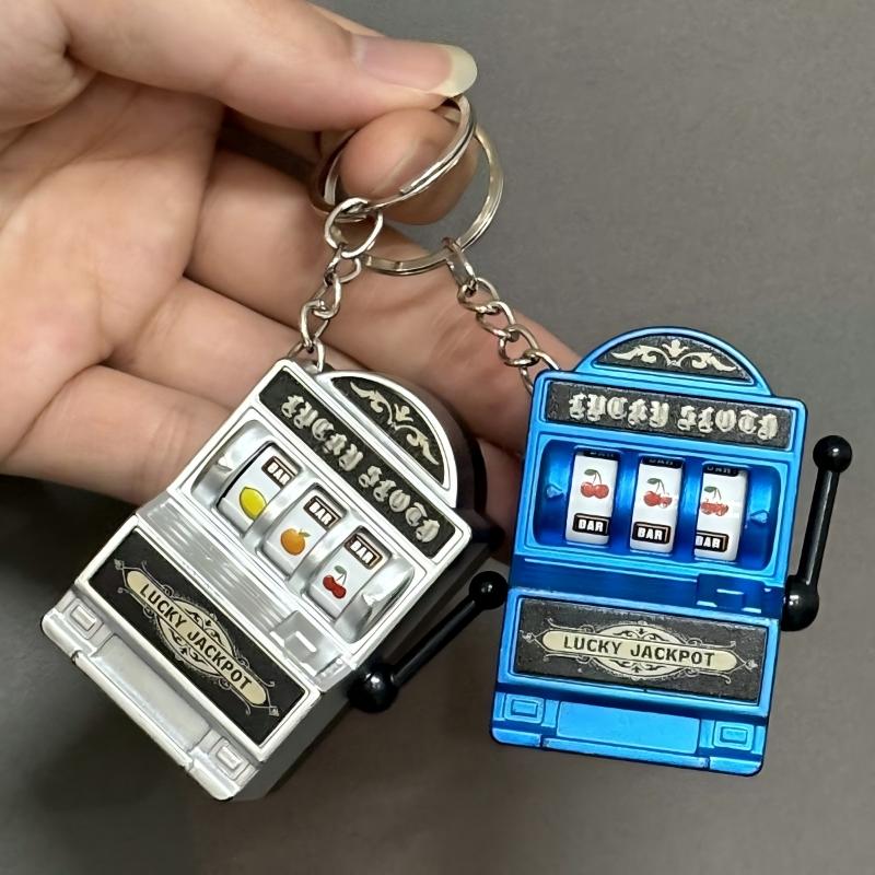 ミニギャンブルスロットマシンキーホルダー、クリエイティブアー - Arcade Game Jackpot のレビューと価格